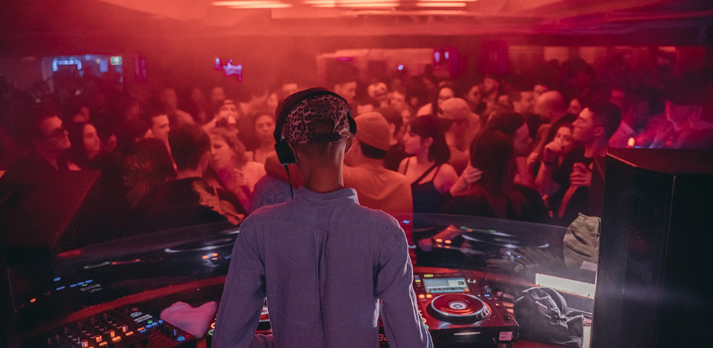 The DJ playing music at Hide and Seek / Taboo Night Club