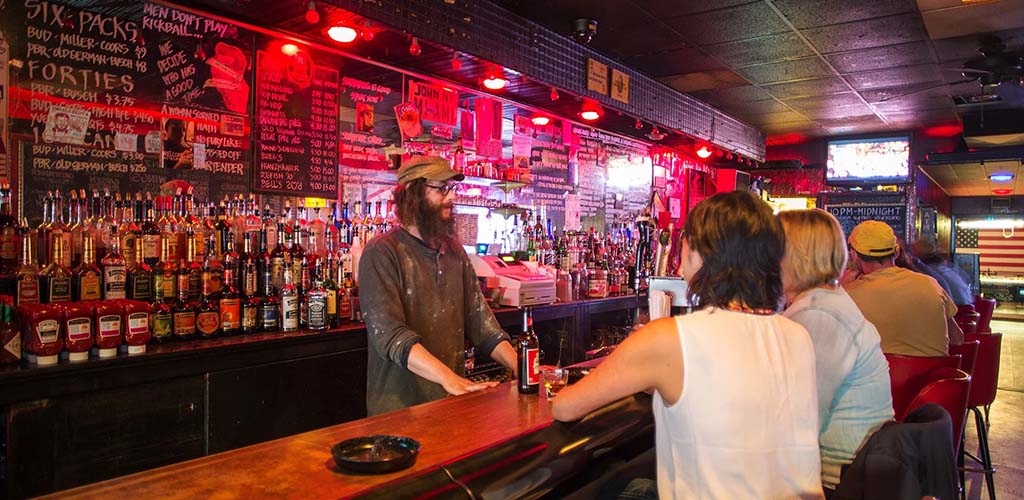 Pittsburgh MILFs sitting on the bar at the super casual bar at Gooski's