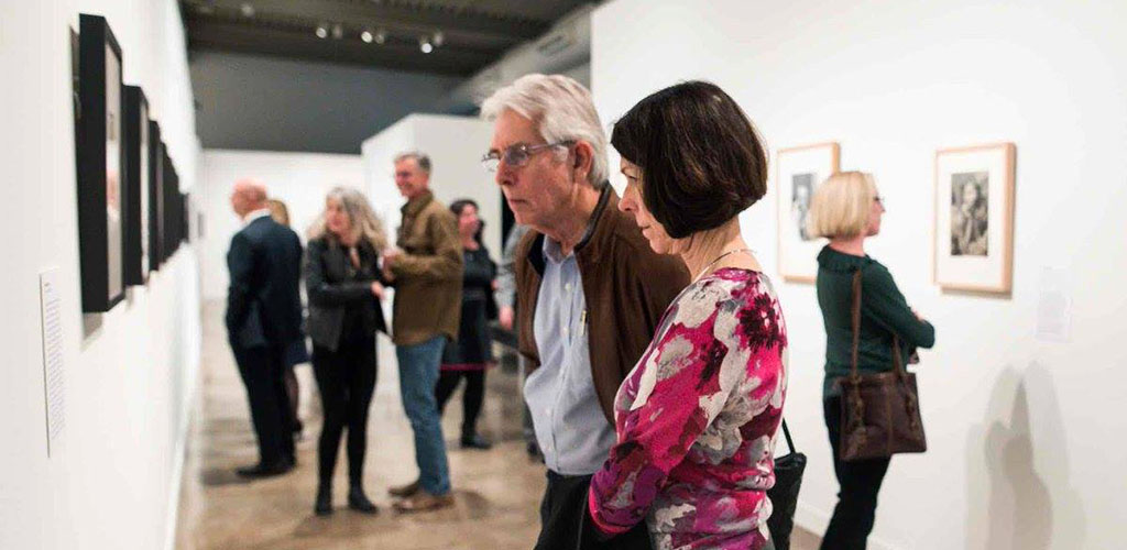 An older couple admiring artwork at the San Antonio Museum of Art