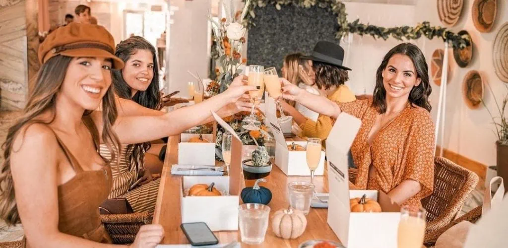 Young Miami MILFs toasting at Shore Club