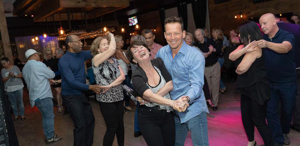 Mature women on the dance floor of Le Coloc Restobar