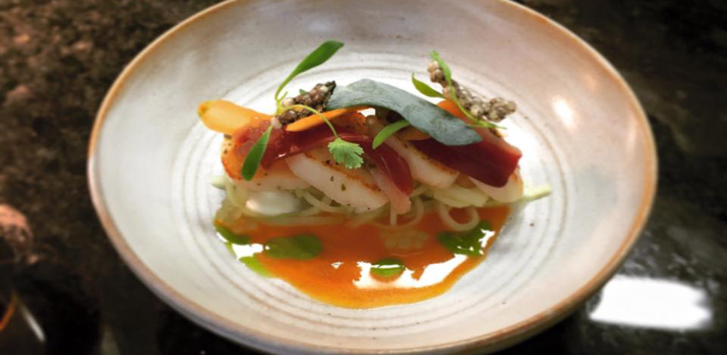 A scallop dish from The Cellar Restaurant