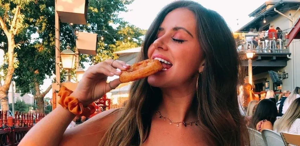 Young Tucson MILF eating churro outside Frog and Firkin