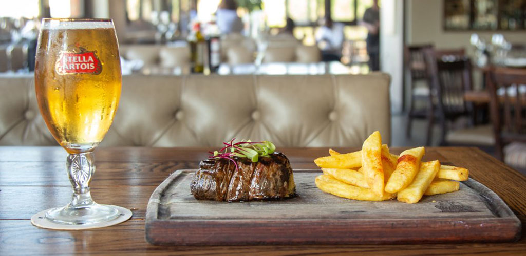 Beer, steak and fries from Butcher Boy's Grill