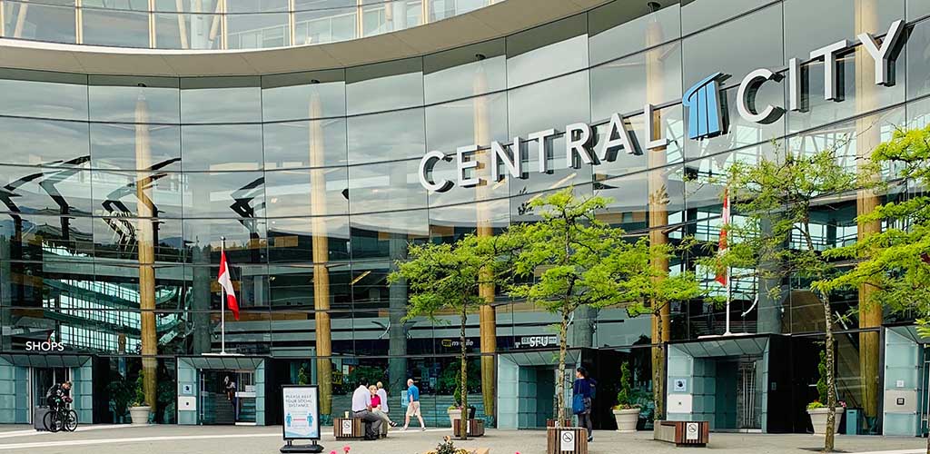 The glass building of Central City Shopping Center