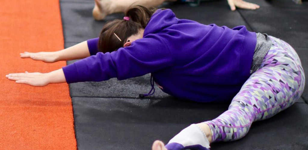 Doing yoga at Unity Gym