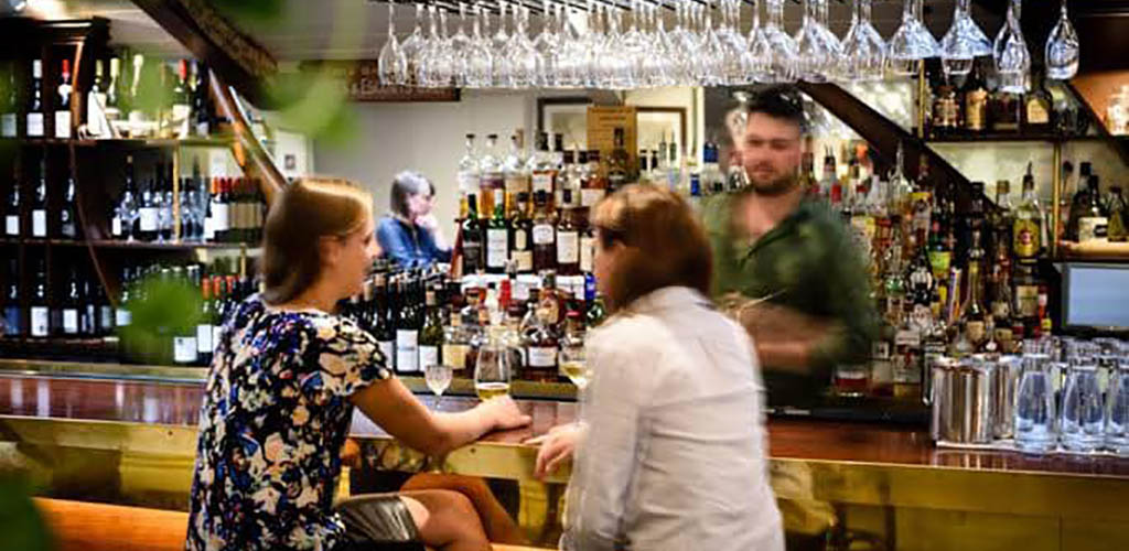 Friends having drinks at Boulcott Street Bistro