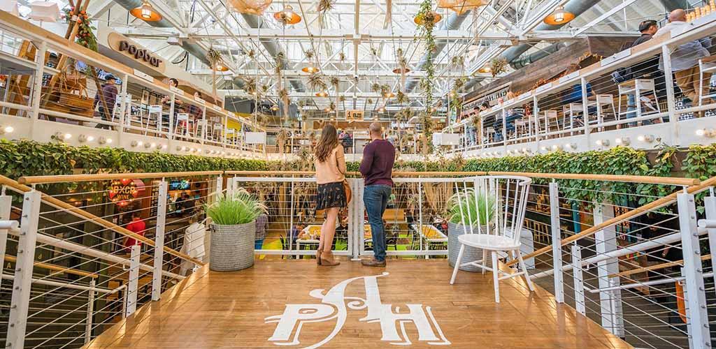 A foodie couple on a date at Anaheim Packing District