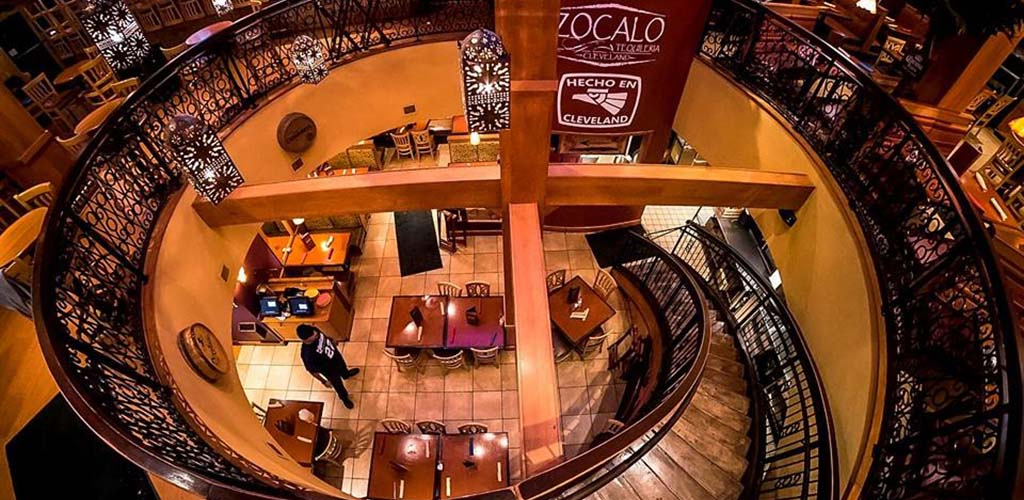 The grand spiral staircase at Zocalo Tequileria