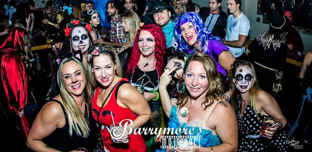 Partygoers in Halloween costumes are Barrymore's Music Hall