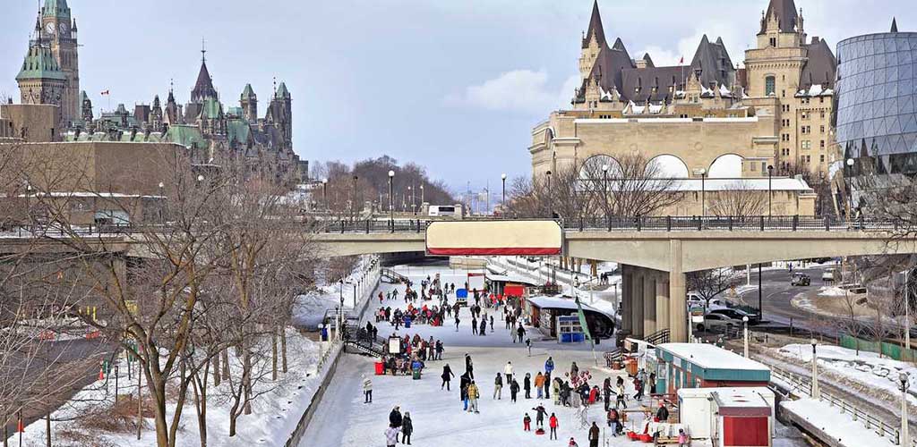 People skating on Rideau Canal in the winter