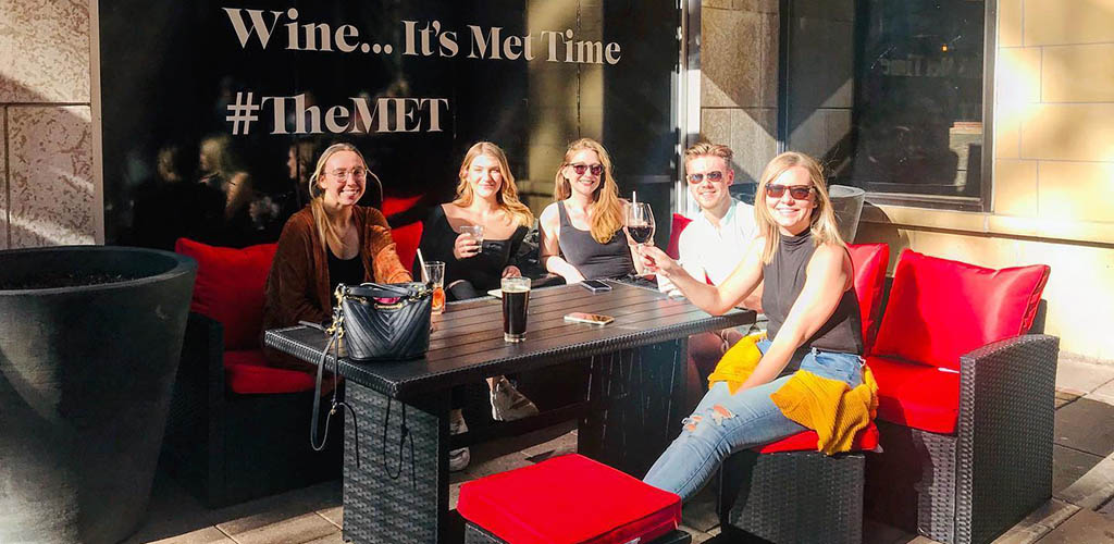 Beautiful mature women having lunch in the patio of The Metropolitan Grill