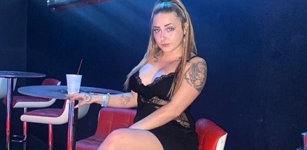 A young St. Louis MILF enjoying a drink at Europe Nightclub