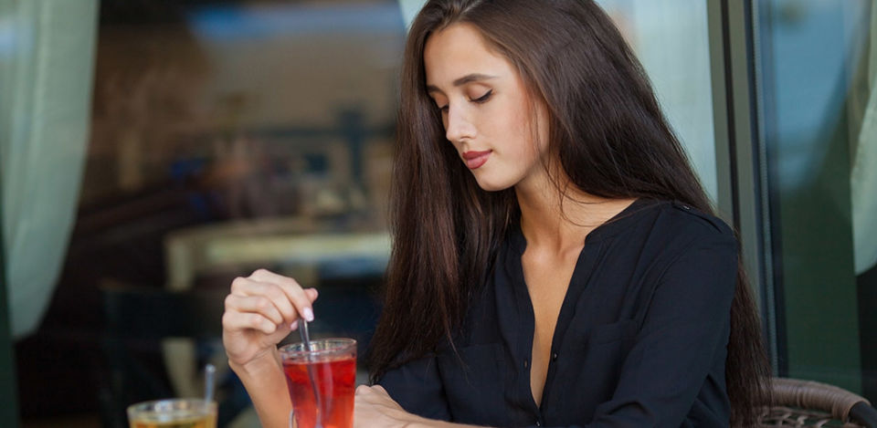 A hot cougar in North Carolina drinking tea in a cafe