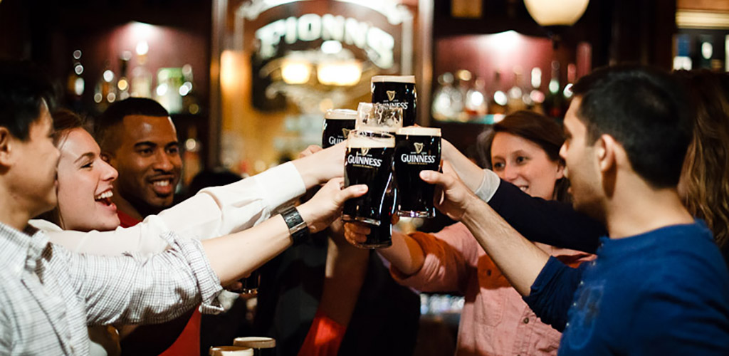 Friends having drinks at Fionn MacCool's 