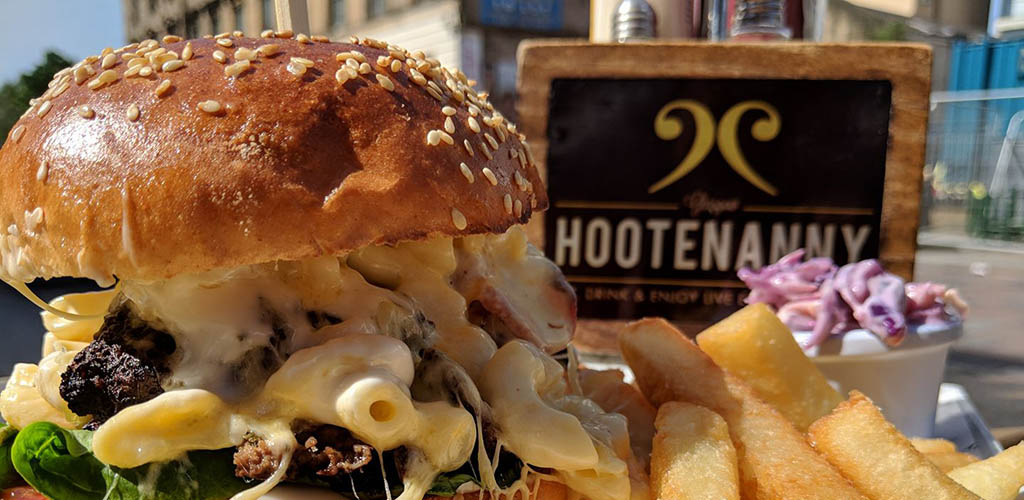 A burger stuffed with mac n cheese from Hootenanny