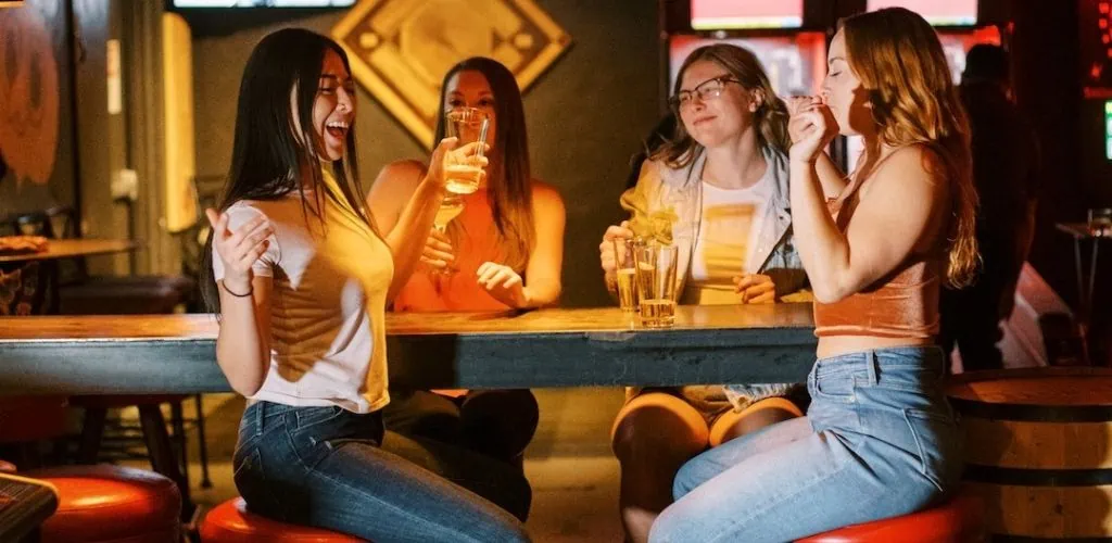 Phoenix MILFs chatting and enjoying their drinks at The Little Woody