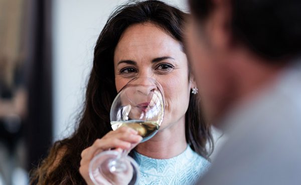 A beautiful woman drinking wine