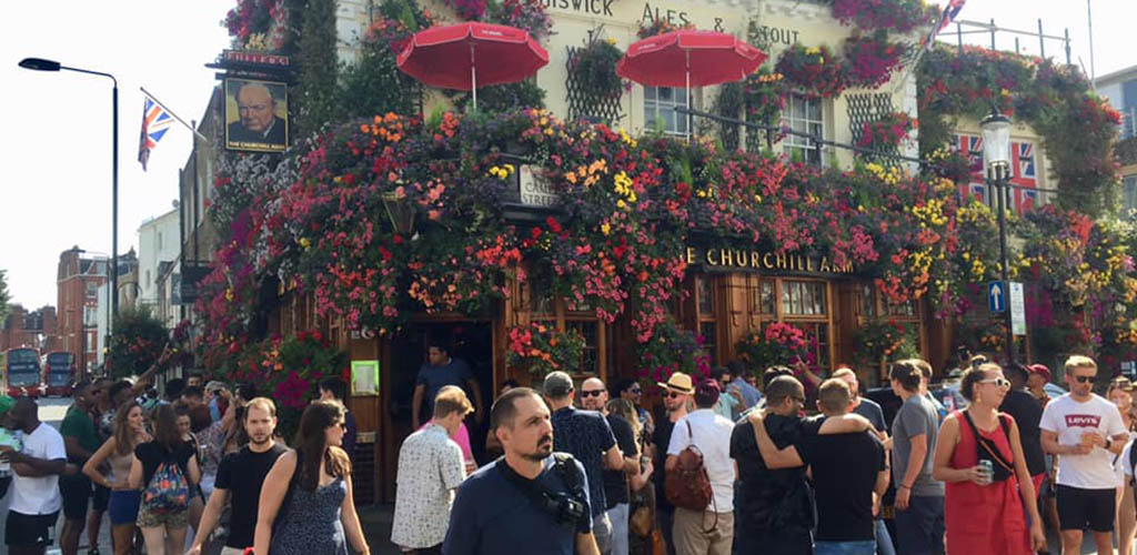 People hanging out outside The Churchill Arms