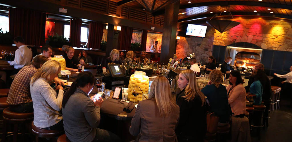 Ladies enjoying drinks at Redstone American Grill