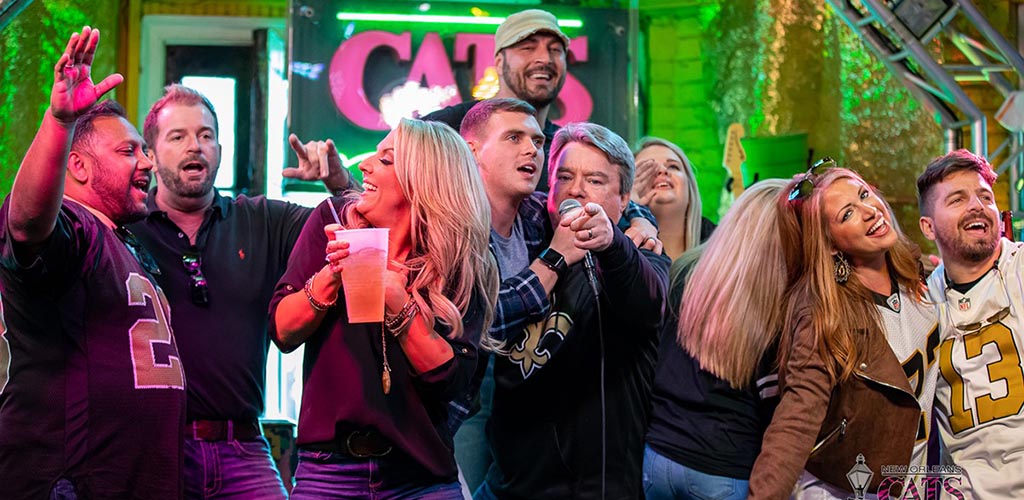 Singing karaoke at Cat's Meow