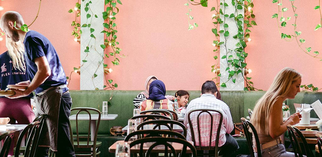 The pink dining area of Farm Girl Cafe