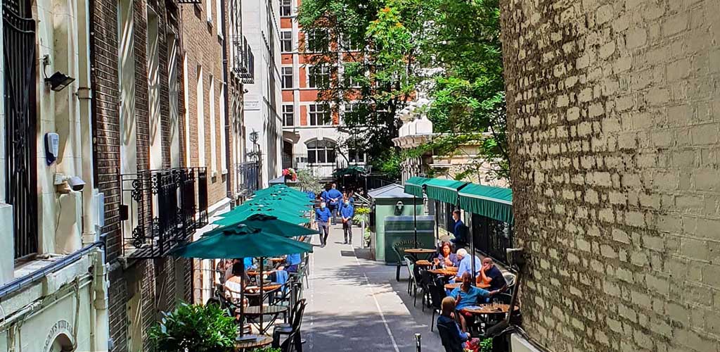 The patio of Gordon's Wine Bar in a cozy alley