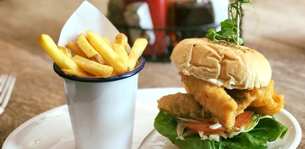 A burger and fries from The Farm Pub