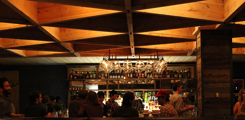 The dark and intimate bar area of Hen of the Wood