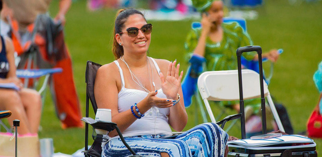 A woman enjoying the show at the Atlanta Jazz Festival