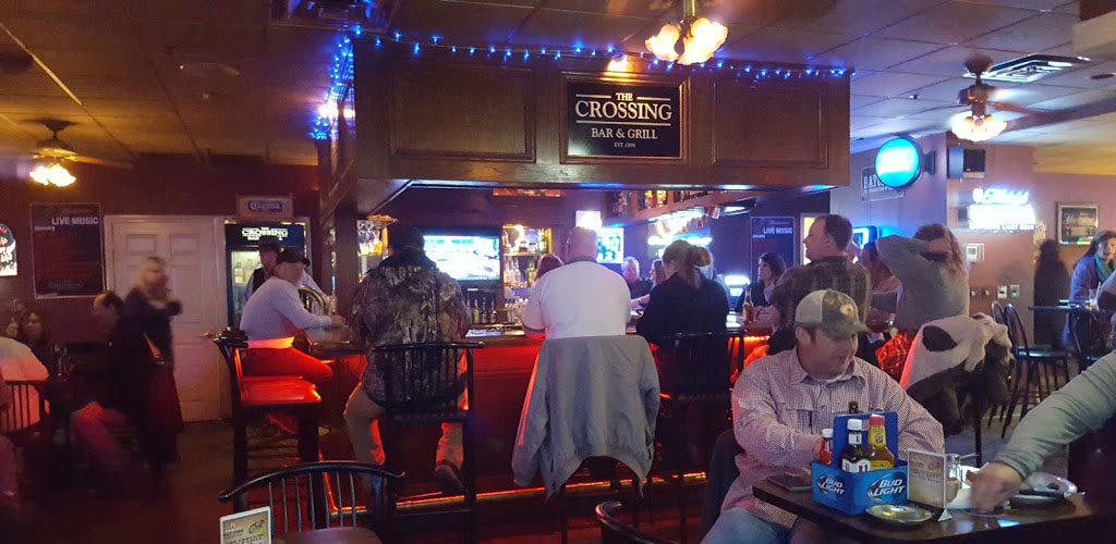 Friendly patrons at The Crossing Bar and Grill