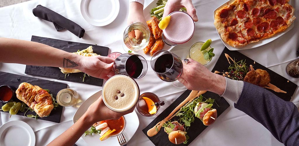 Flat lay of various dishes and drinks from Franchesco's Ristorante