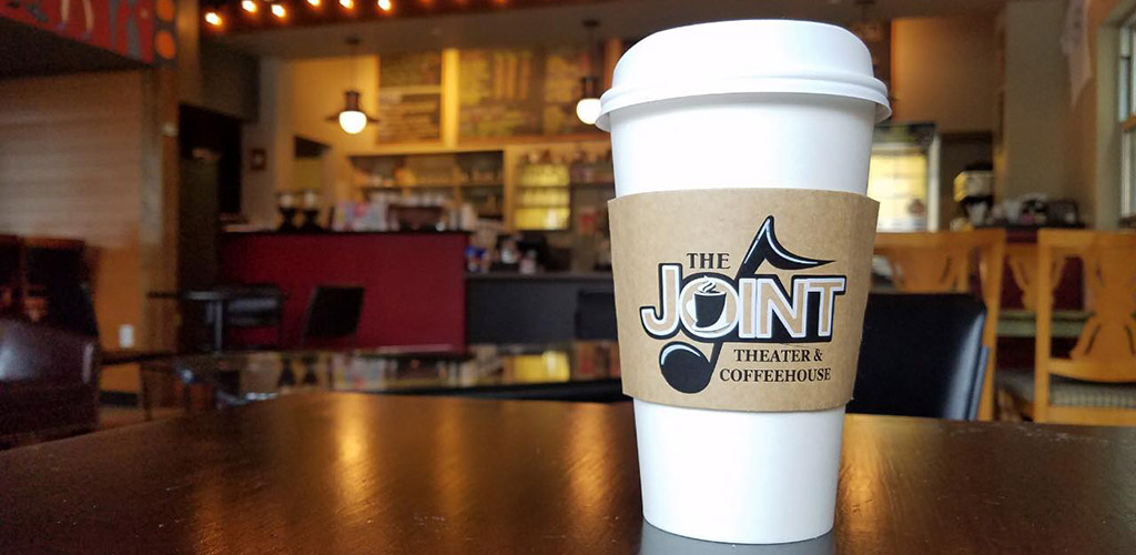 A cup of coffee from The Joint Theater and Coffeehouse