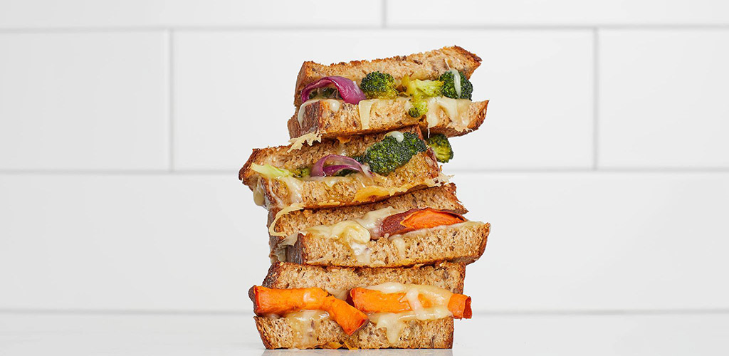 A stack of sandwiches made with ingredients from Whole Foods