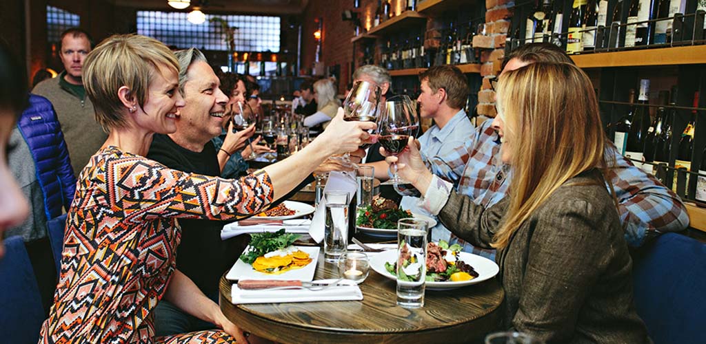 Mature women having drinks with friends