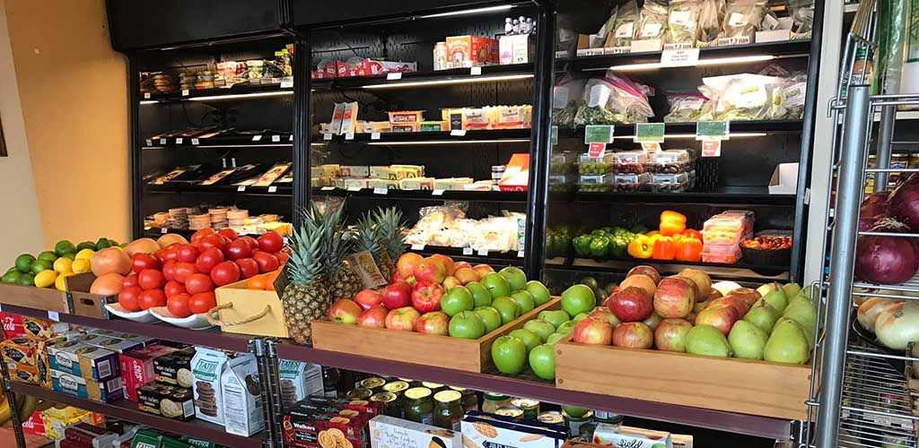 The produce area at Stratton’s Market full of fresh fruits and vegetables