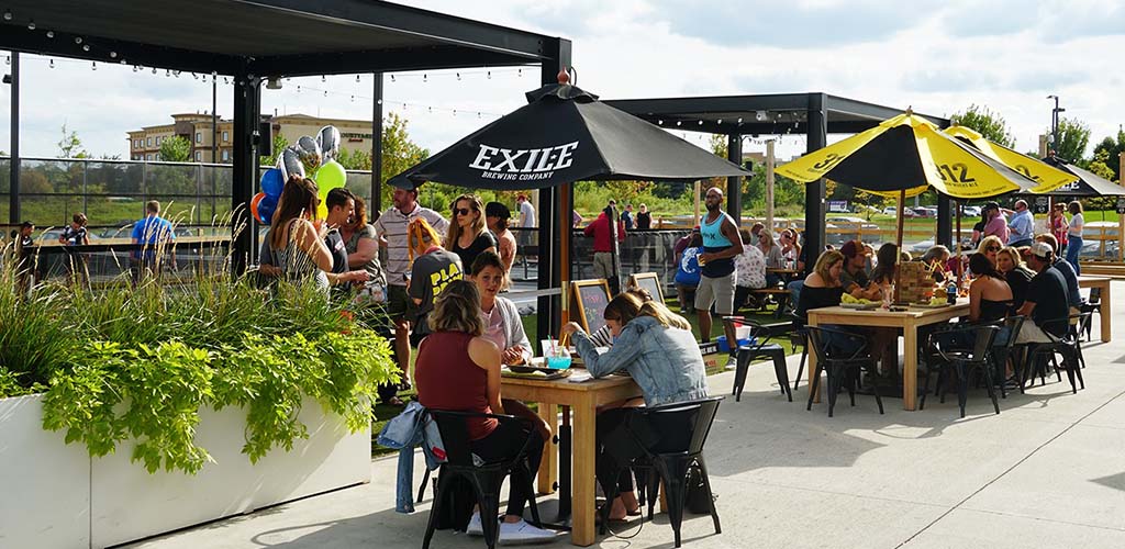 Iowa MILFs in the outdoor seating area at Smash Park