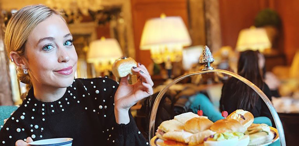 A beautiful woman during tea time at The Grand America Hotel