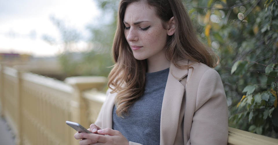 A woman frustrated with terrible free dating apps