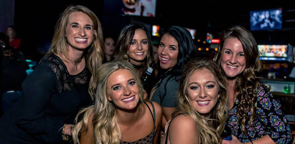 A group of single women at Whisky River