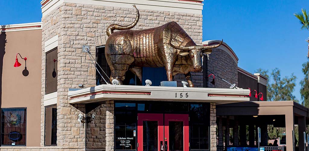 The imposing exterior of Raging Bull Steakhouse & Sports Bar 