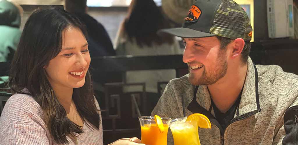 A couple on a date at Flat Top Grill