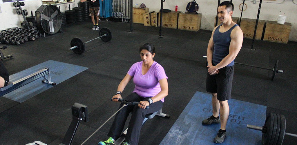 Working out at the rowing machine at Crossfit 101