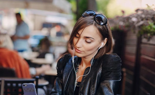 beautiful girl enjoys gadgets