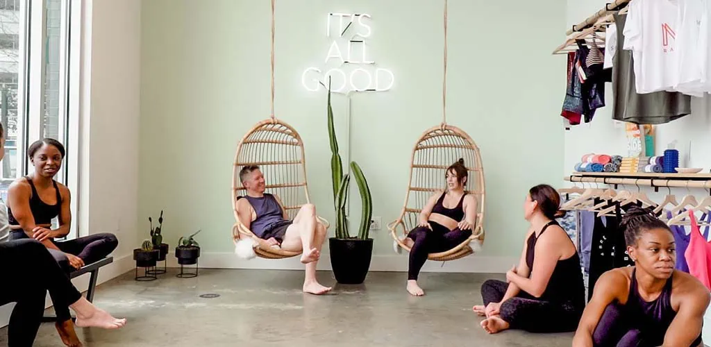 Women hanging out before class at Midtown Yoga Studios