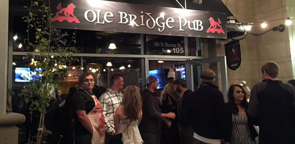 Young singles waiting outside Ole Bridge Pub in Reno looking for hookups