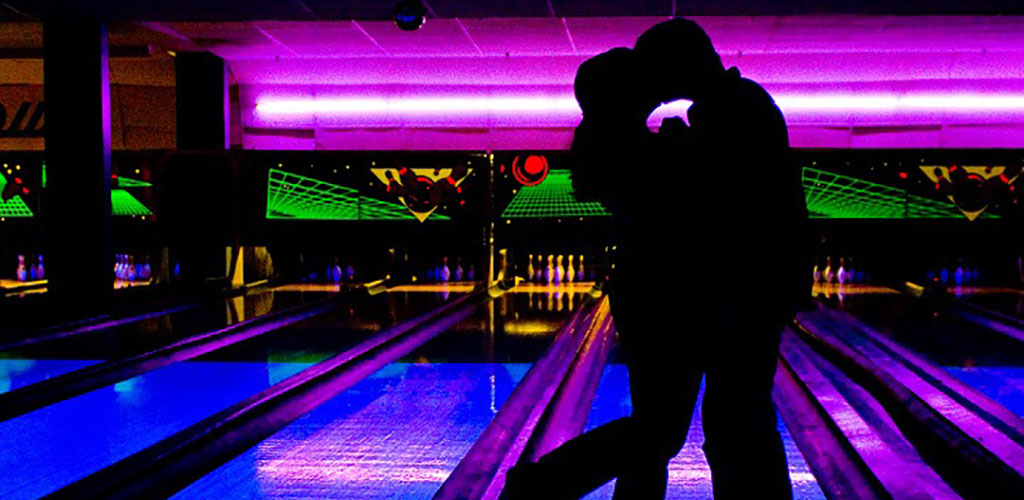 A couple on a date at Cowtown Bowling Palace