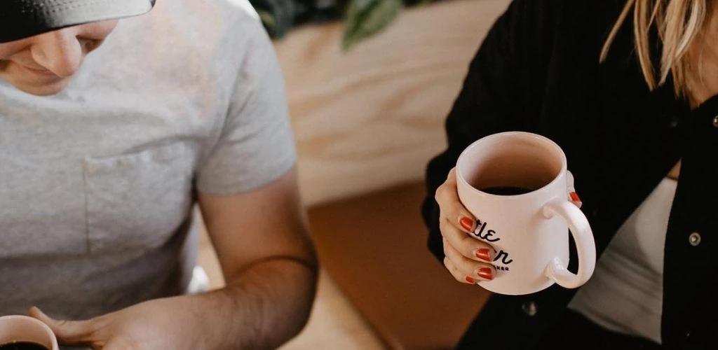 A Winnipeg couple on a date at Little Sister Coffee Maker