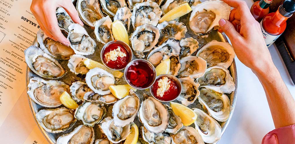 A platter of fresh oysters from Jax Fish House and Oyster Bar