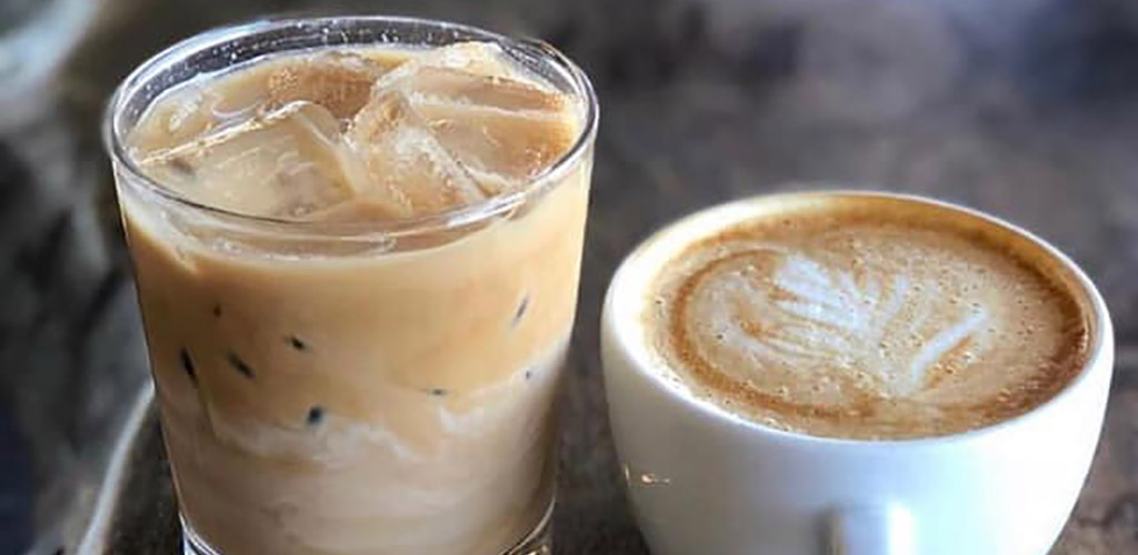 An iced latte and latte art from Kinsley House